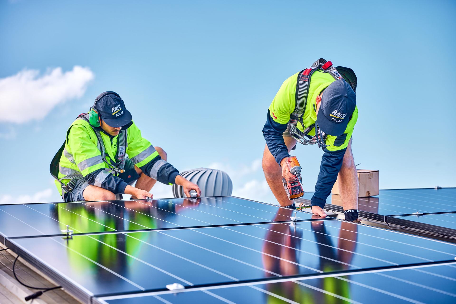 RACV Solar installers on the roof